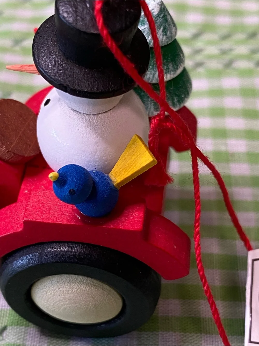 Ulbricht Red Wooden Tractor Ornament with Snowman and Tree (VO)